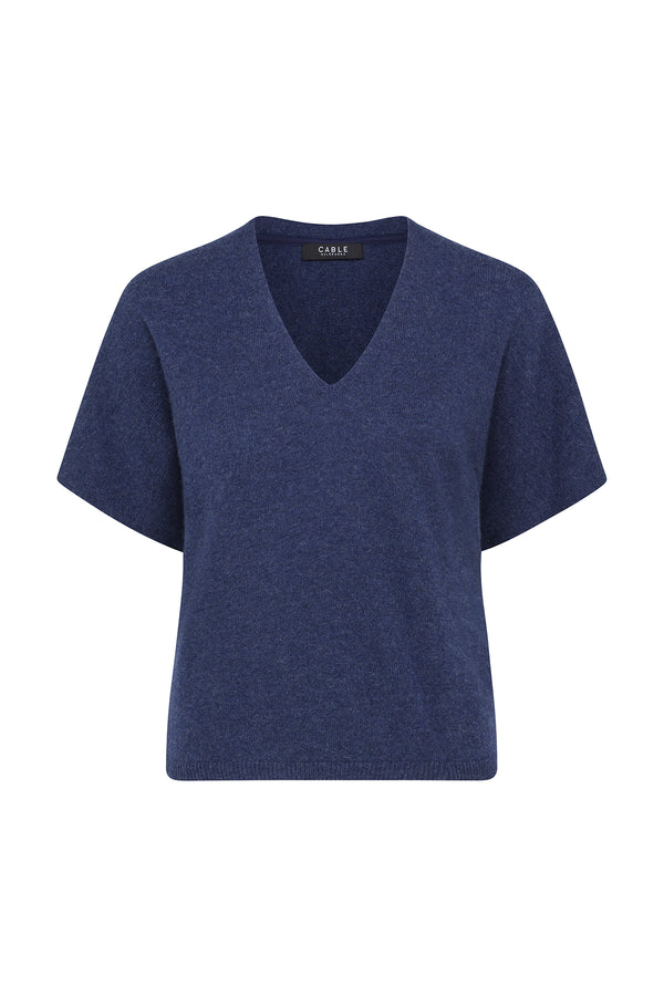 Denim blue pure cashmere relaxed fit V-neck top with short sleeves and ribbed hem.