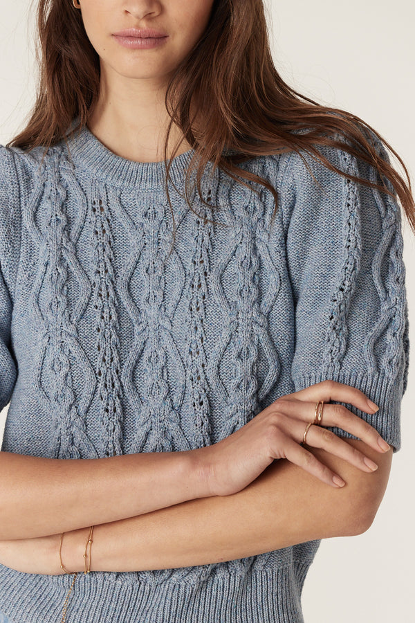 Dusty blue Tavi Knit Top with cable stitch, crew neckline, and tucks at sleeve head.