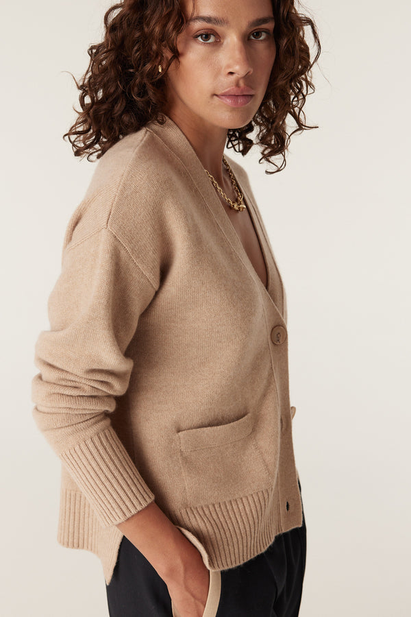 Camel Cashwool V-neck cardigan with single button closure, ribbed cuffs, and front pocket.