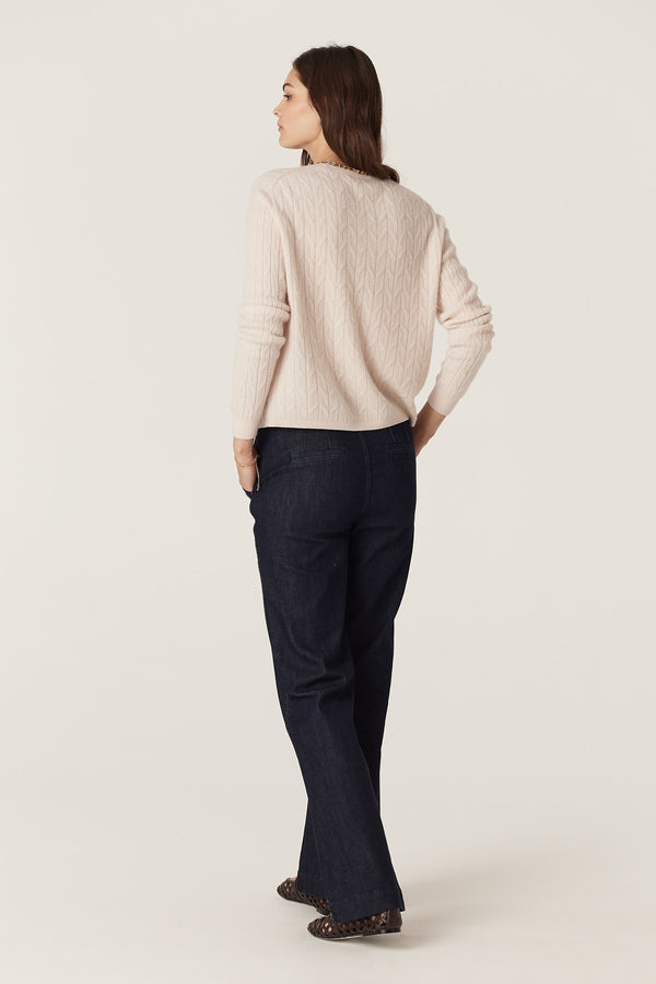 Blush Cashwool Cable Crew Jumper with classic cable knit texture, shown on a model from the back.