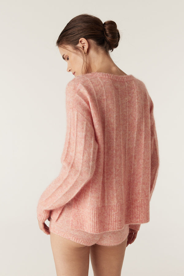 Melon mohair blend crew neck jumper with jersey stripe stitch, worn by a model.