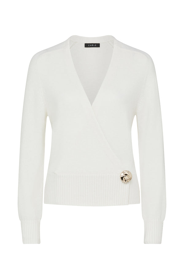 Milk white Cashwool wrap knit jumper with a V-neck and a gold decorative button.