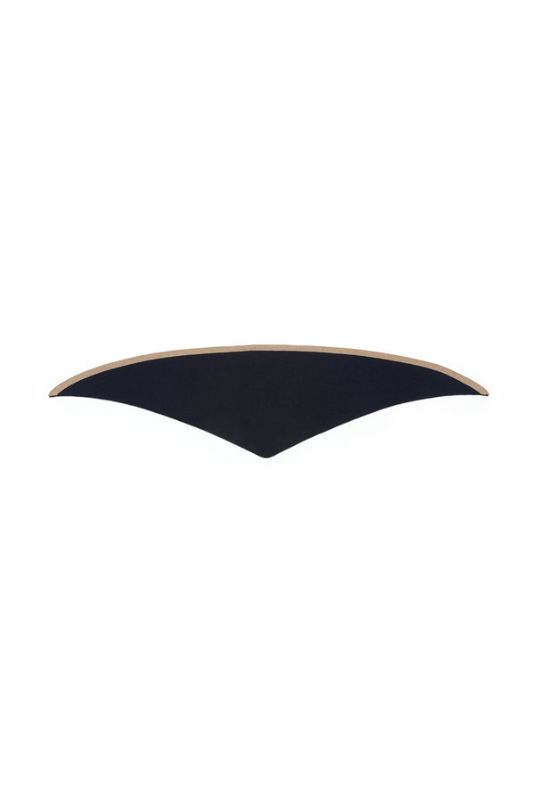 Navy Cashwool neck scarf, folded and curved, with a light tan underside visible.