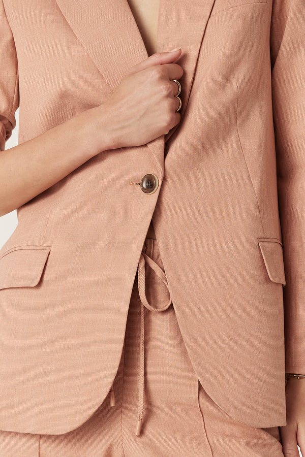 Owen Blazer in clay, a relaxed fit women's blazer with revere collar, single button closure, and functional pockets.