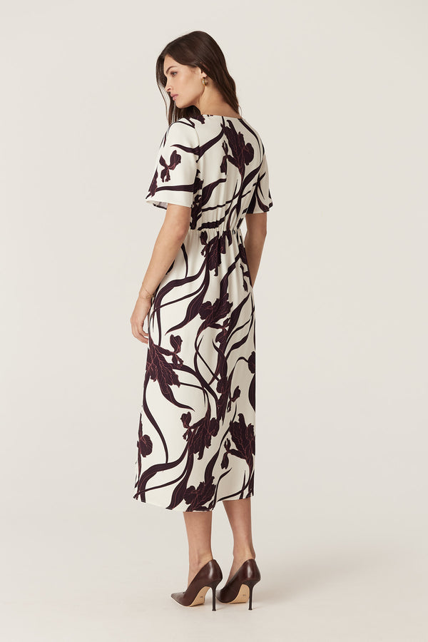 Neve Dress in Iris Print: relaxed fit, V-neck, flared sleeves, front split, back elastic, viscose crepe.