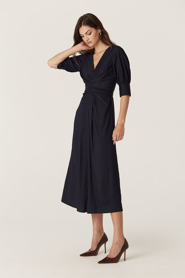 Navy Holly Dress: relaxed fit, V-neck, obi wrap waist, elbow sleeves, satin back viscose.