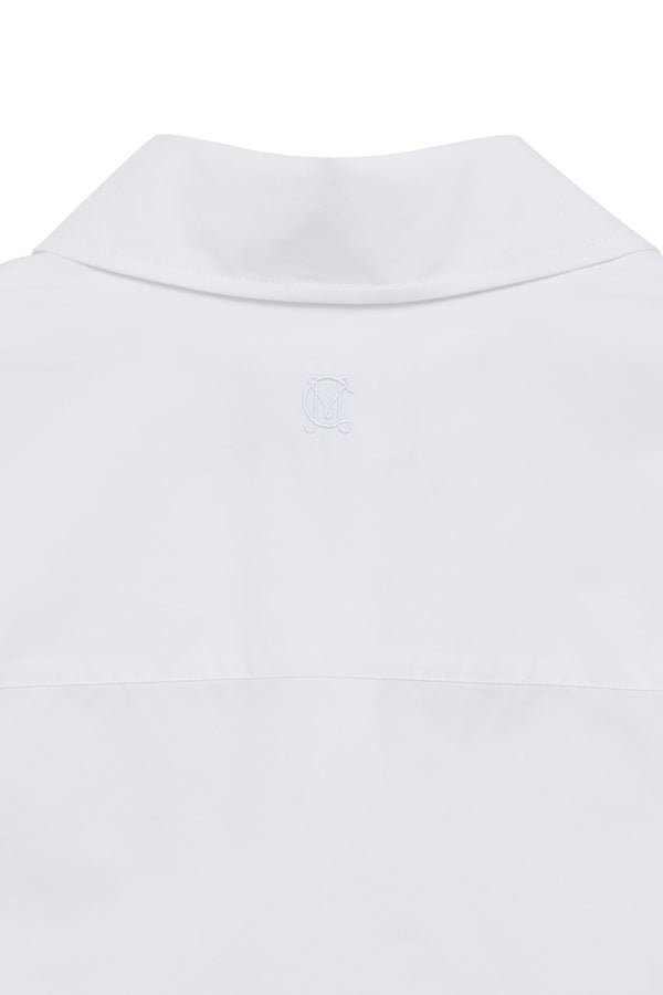 Close-up of the back of a white 100% crisp cotton May Shirt, showing the collar, back yoke, and subtle embroidered logo.
