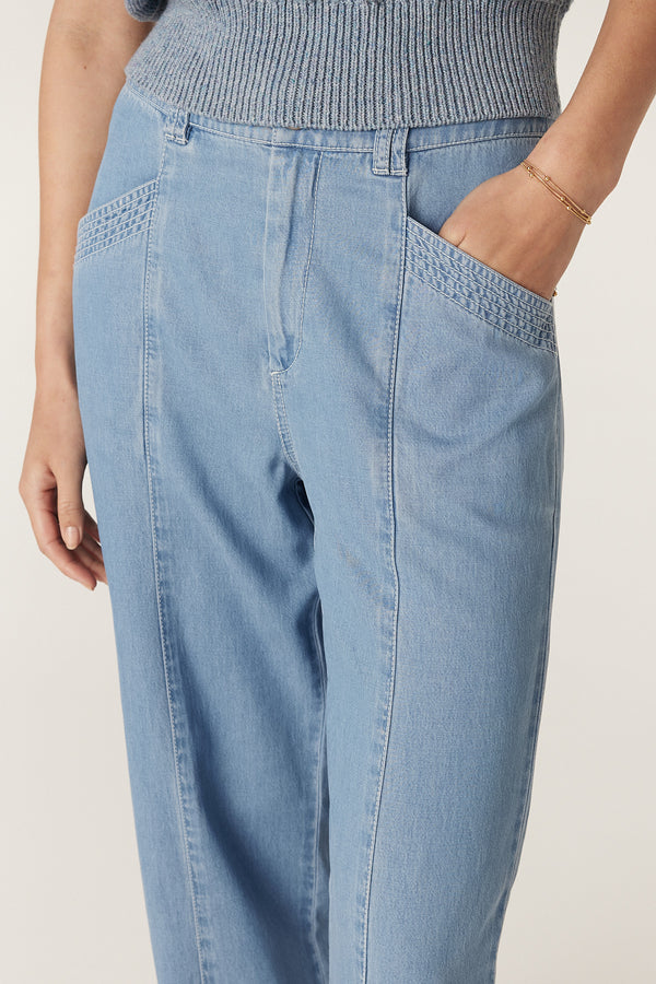 Light blue Pearce Pant with wide leg, zip fly, double belt loops, and front pockets.