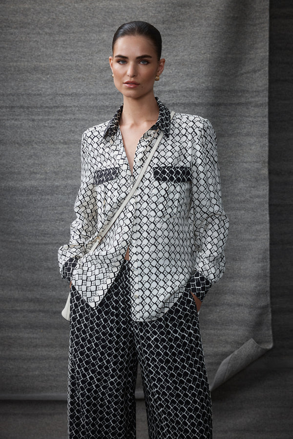 Hamilton Blouse: Ivory geo print silk blend twill shirt with patch pockets, button front, and full sleeves.