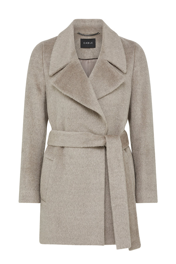 Fawn Sinclair wool coat with wide lapels, a belted waist, and a relaxed fit.