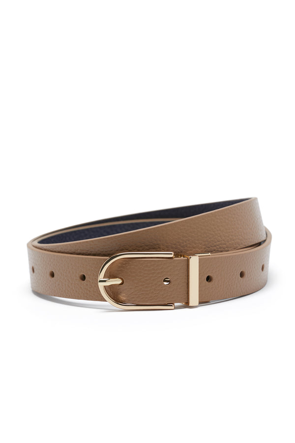 Tan and navy genuine leather reversible belt with a gold hardware buckle, coiled on a white background.