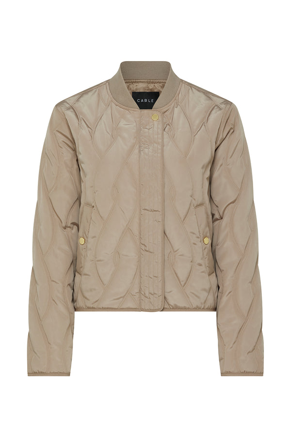Fawn Martina Puffer jacket with quilted cable design, rib collar, front zipper, and gold press studs.