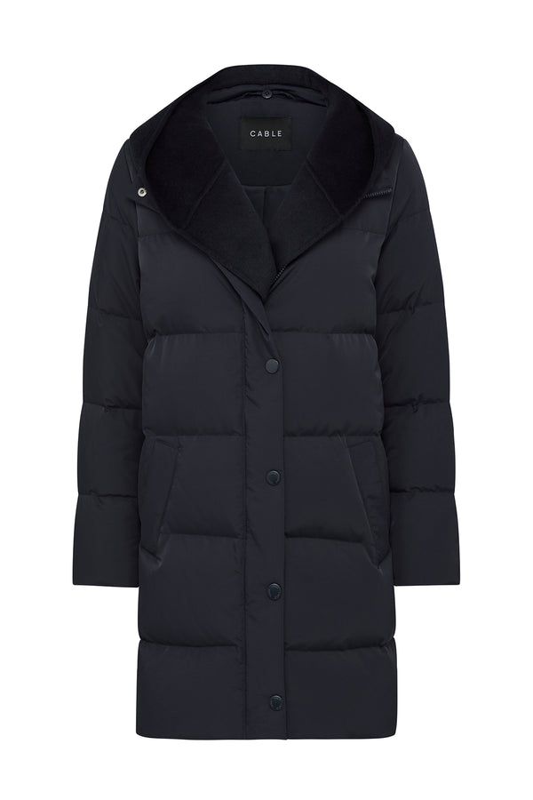 Navy Henderson Puffer jacket with a plush collar, button-front closure, and horizontal quilting.