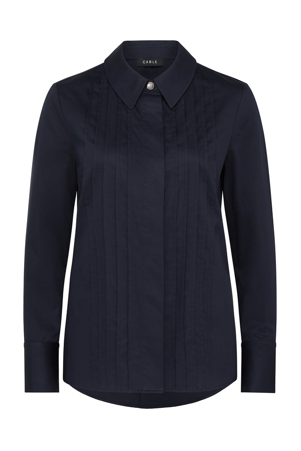Navy Chester Pintuck Shirt with long sleeves and a single pearl button at the collar.