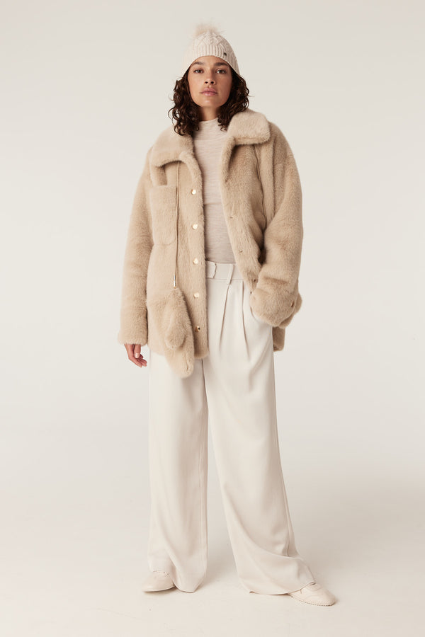 Franzi camel faux fur jacket with wide collar, button closure, and drawstring details.