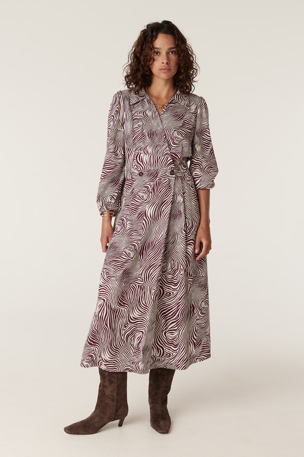 Anouk zebra print midi dress in burgundy and cream, featuring a collared V-neck and wrap-around belt.