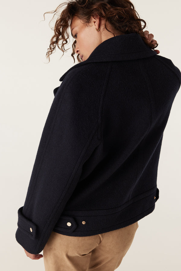 Roy Jacket in navy wool, featuring a wide collar, gold button details, and a cropped fit.