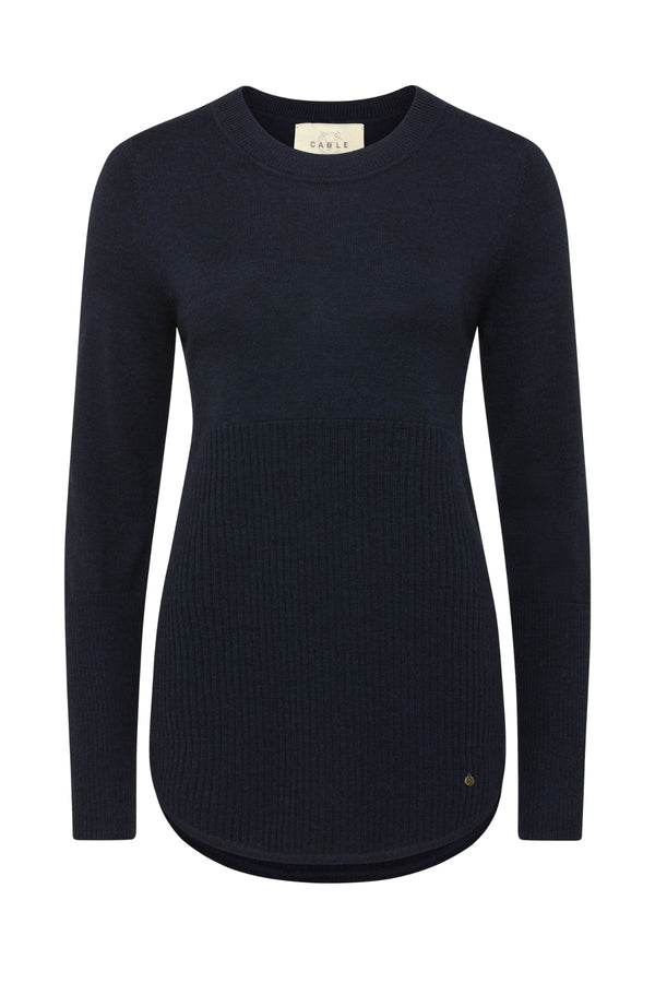 Midnight navy merino wool jumper with a ribbed lower panel, crew neck, and curved hem.