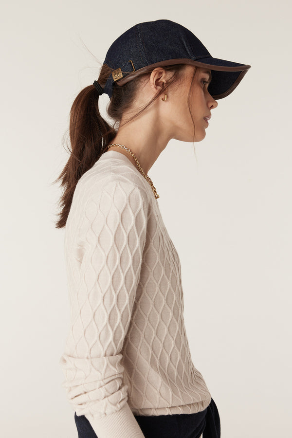 Antique white Merino wool jumper with diamond cable stitch, crew neck, and rib trims.