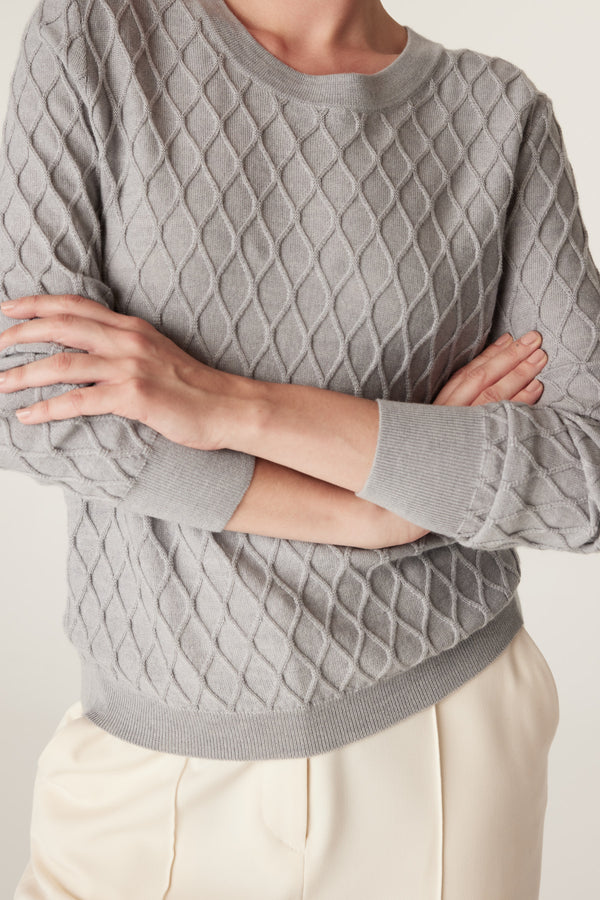 Grey marle Merino wool jumper with diamond cable knit, crew neck, and ribbed trims.