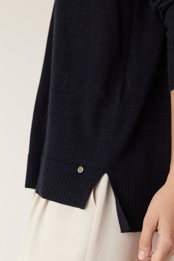 Midnight Navy Saxon Fine Merino Jumper with side split hem, rib trim, and Heritage branded plate.