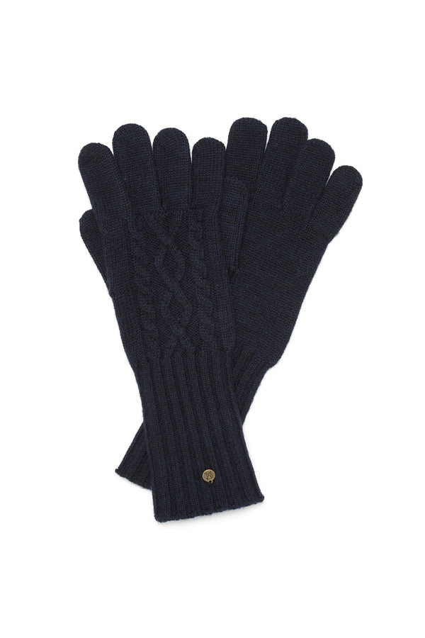 Midnight navy merino wool gloves with a diamond cable stitch and ribbed cuffs, featuring a small gold branded plate.