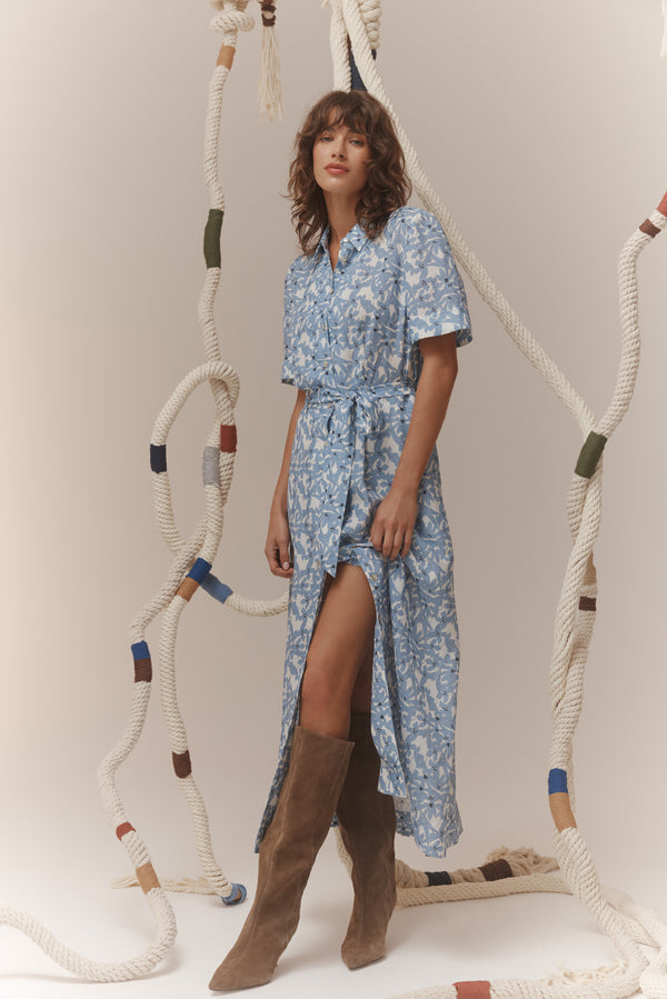 Juliette midi dress in blue floral print with a collared, button-through front, short sleeves, and a matching tie waist belt.