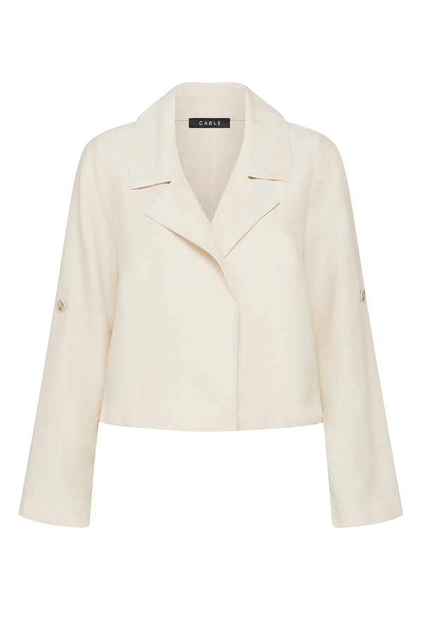 Ecru Goldie jacket in a relaxed, open-front design with a collared neckline and roll-up sleeve tabs.