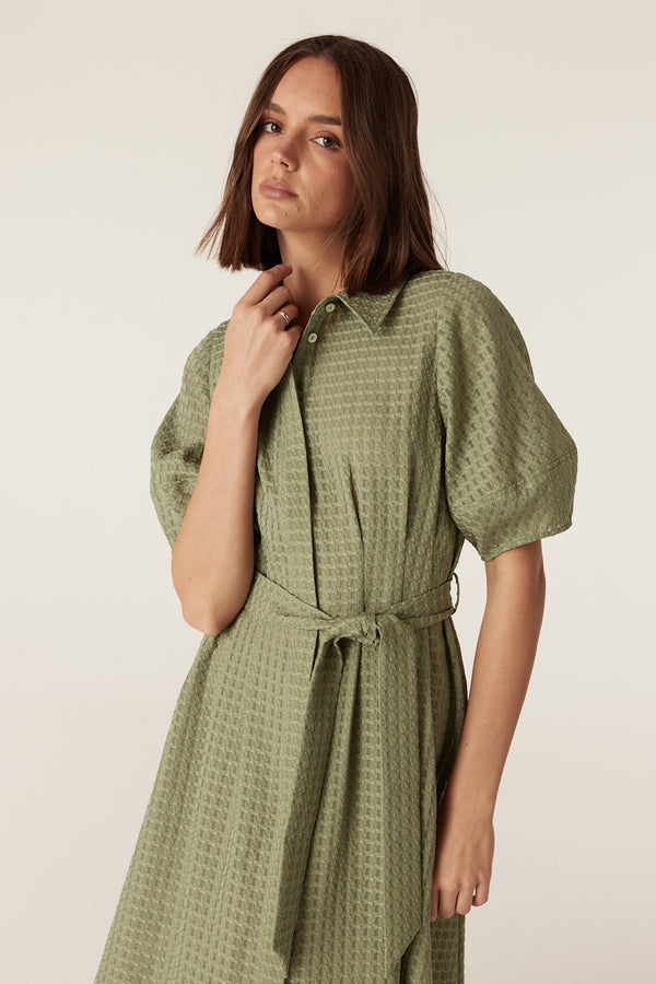 Olive midi dress in burnout textured fabric with a button-through front, collar, and matching tie waist belt.
