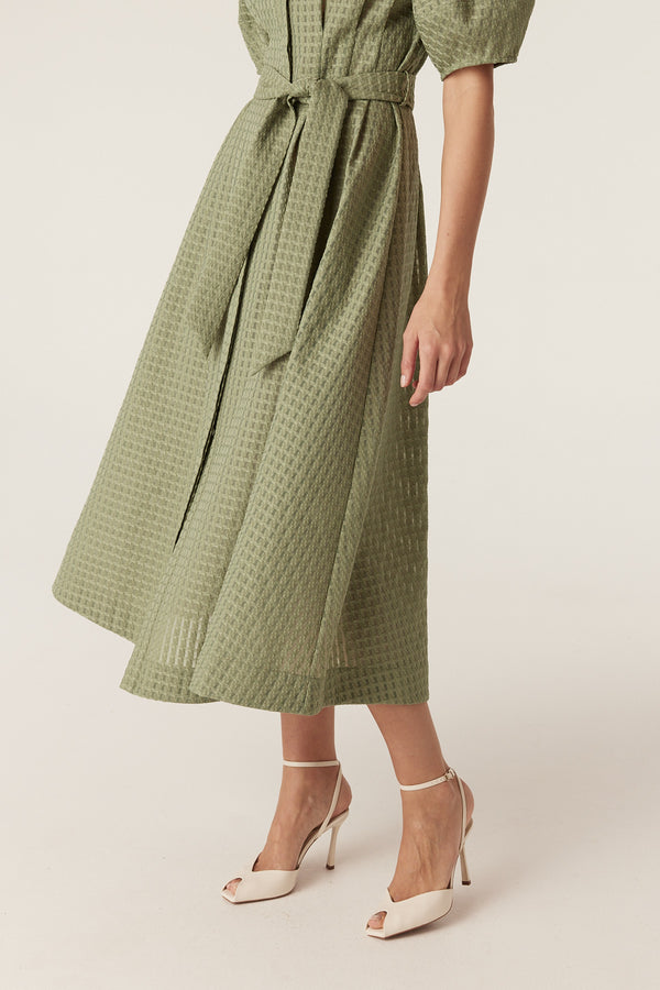 Olive midi dress in burnout textured fabric with a button-through front and matching tie waist belt.