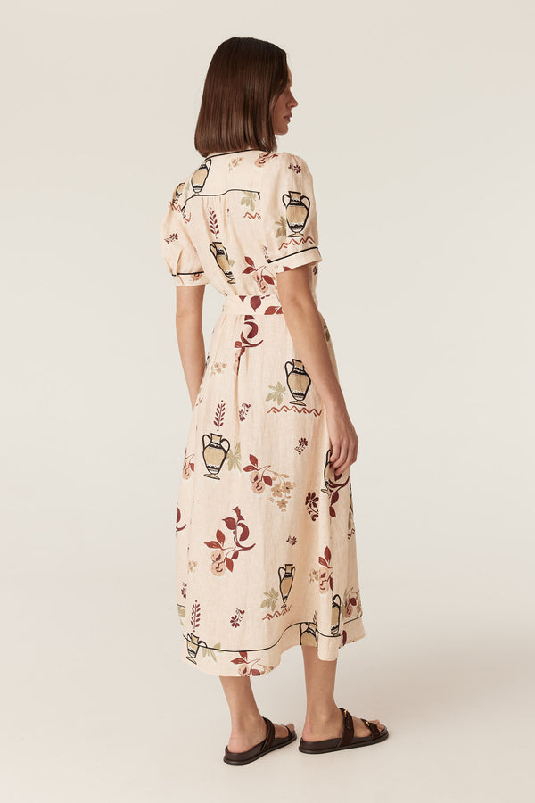 Avondale linen midi dress in rustic garden print with short sleeves, contrast piping, and a matching tie belt.