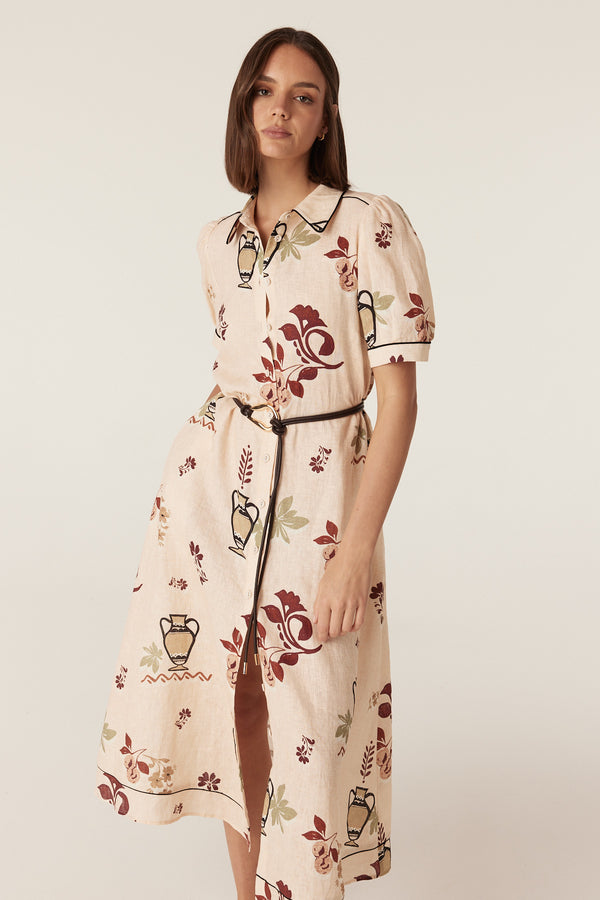 Avondale midi dress in beige linen with a rustic garden print, button-through front, short sleeves, and a tie belt.