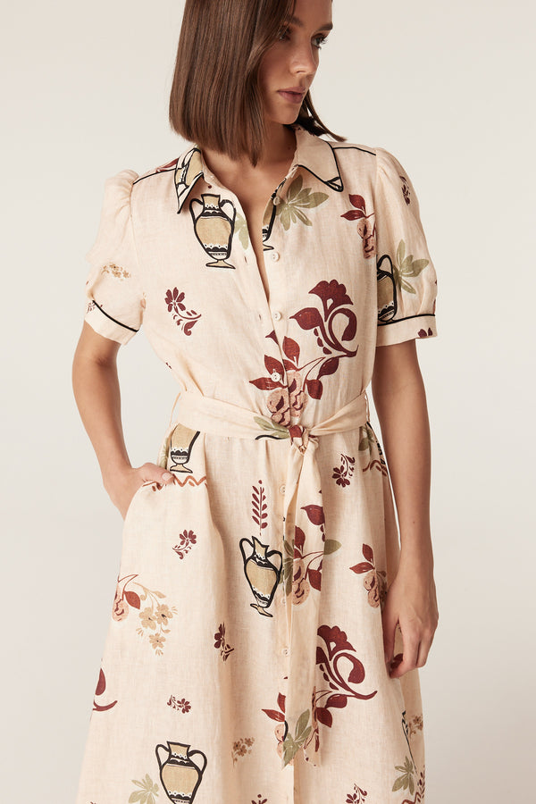 Avondale midi dress in beige linen with a rustic garden print, button-through front, and matching tie belt.