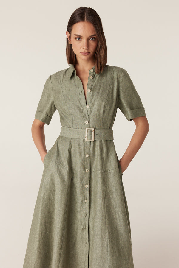 Green French linen midi dress with a collared button-front, short sleeves, and a matching buckled waist belt.