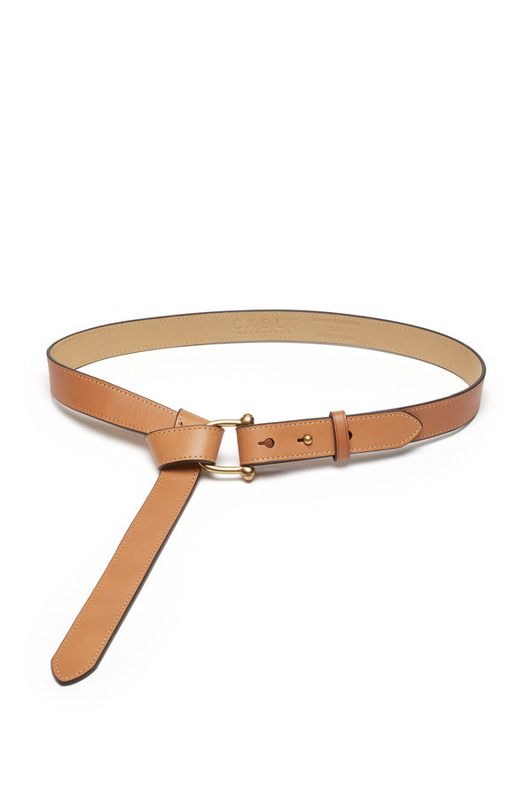 Tan leather belt with a polished gold-tone buckle and a unique knotted design, shown on a white background.
